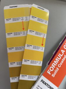 PANTONE Solid Coated fan 2023 with errors in the ink formulation. Two colours each have the identical colour formulation, which cannot be correct.